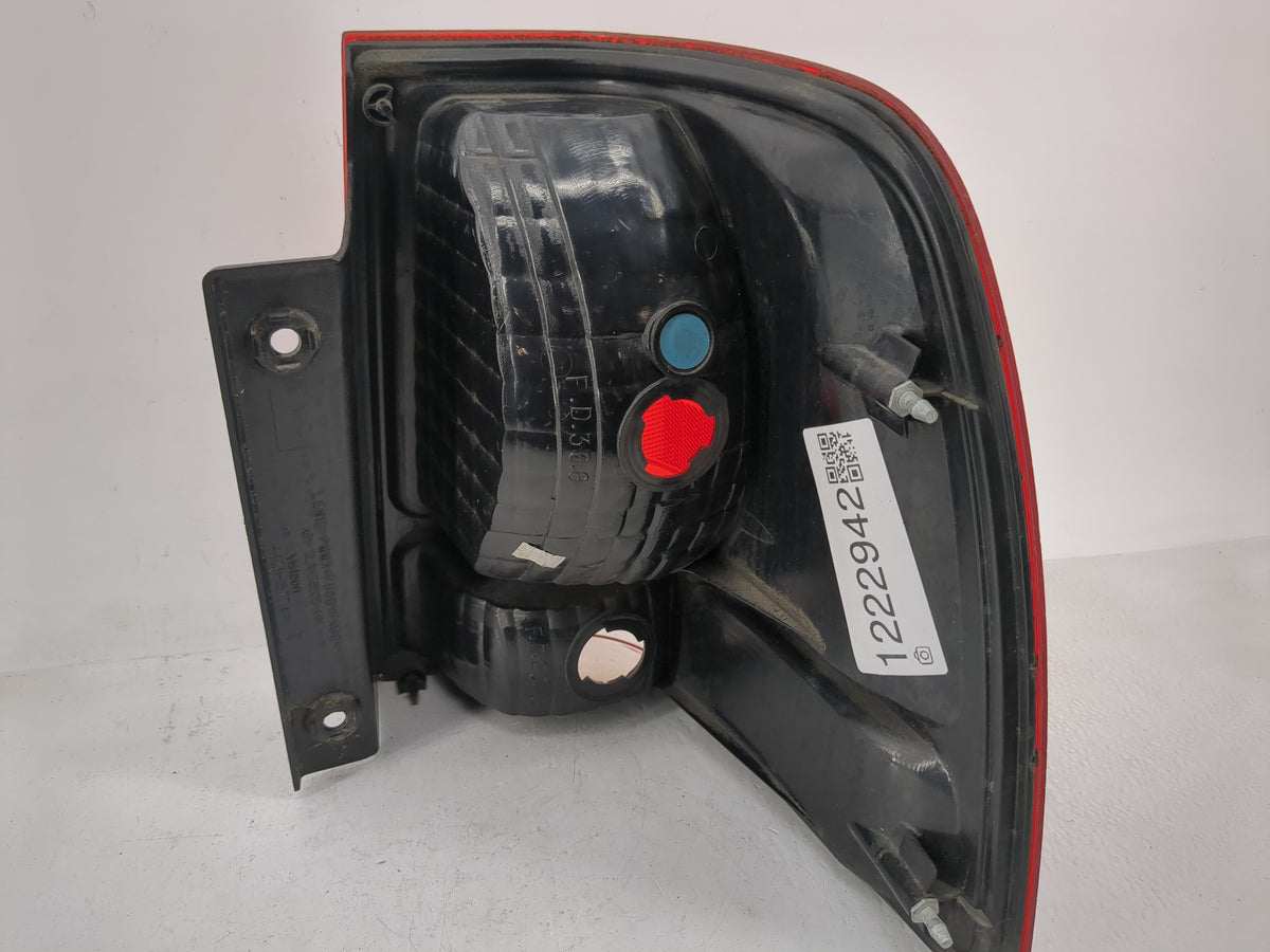 2003-2006 Ford Expedition Tail Light Assembly Driver Left OEM P/N:2L1X-13B504-A Fits Fits 2003 2004 2005 2006 OEM Used Auto