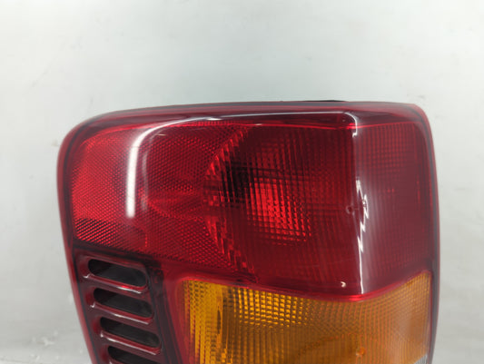 2003-2004 Jeep Grand Cherokee Tail Light Assembly Driver Left OEM P/N:3911-02A Fits Fits 2003 2004 OEM Used Auto Parts