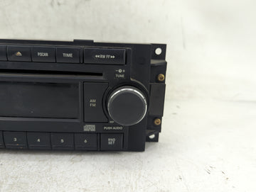 2006-2007 Jeep Commander Radio AM FM Cd Player Receiver Replacement P/N:P05064171AE Fits Fits 2004 2005 2006 2007 2008 2009 2010 OEM Used Auto Parts