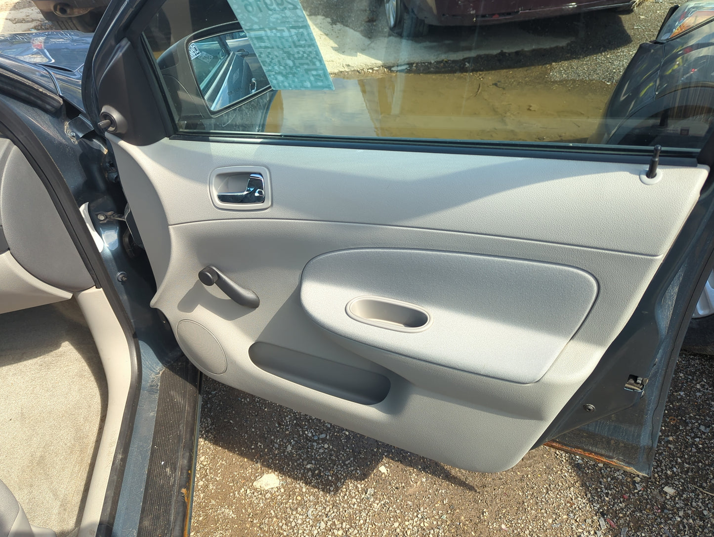 2007 Chevrolet Cobalt Front Right Passenger Interior Door Panel Trim - Oemusedautoparts1.com