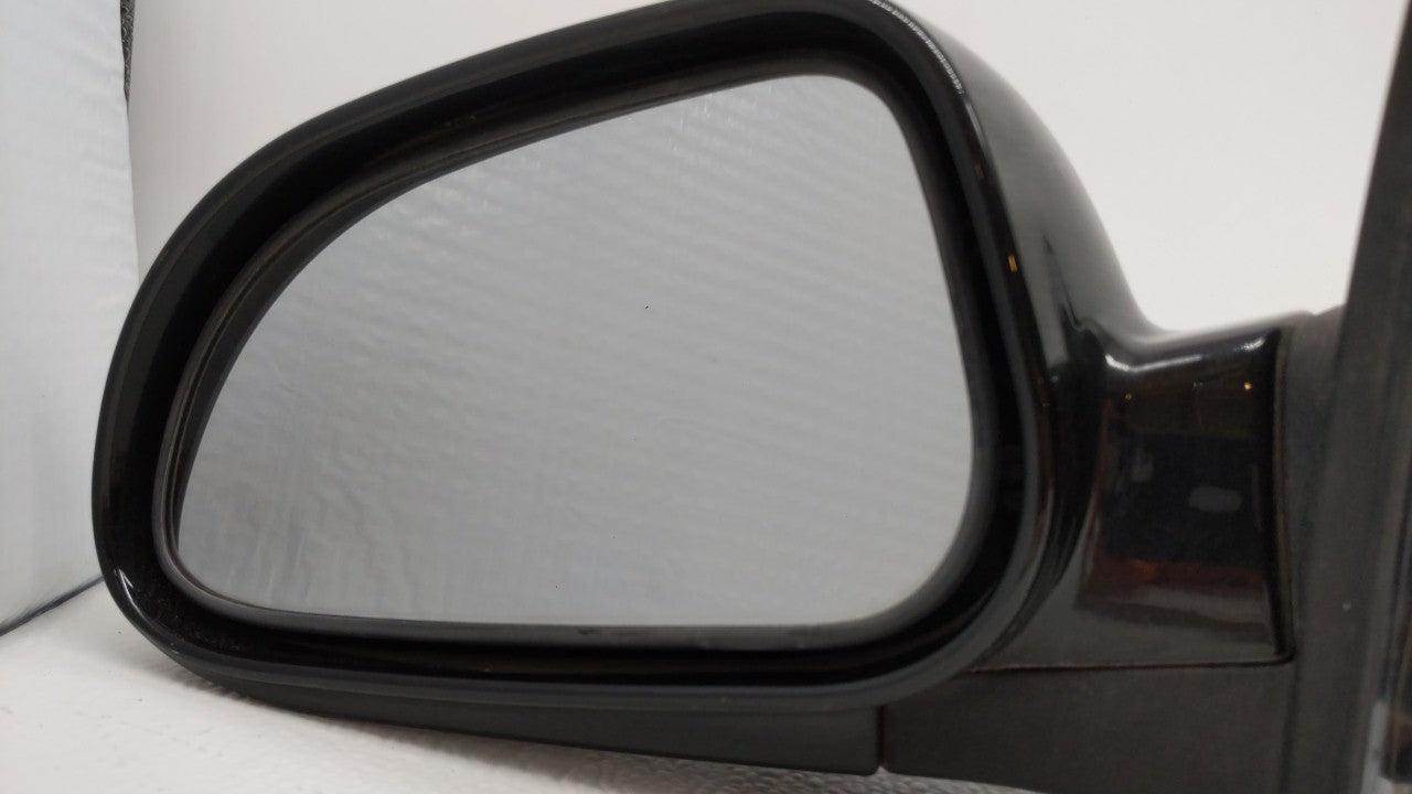 2004-2008 Suzuki Forenza Driver Side View Mirror - Left Door Mirror OEM Used - Oemusedautoparts1.com