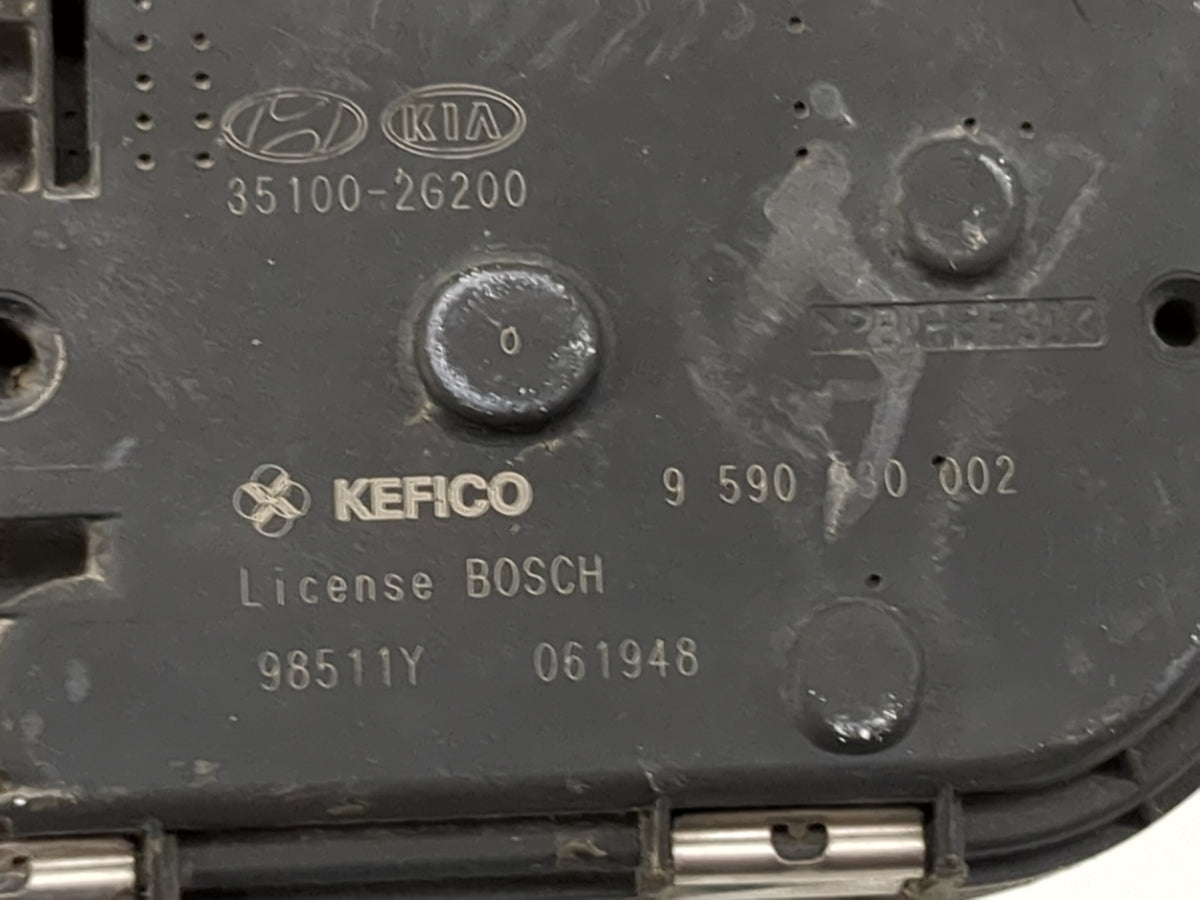 2010-2013 Kia Forte Throttle Body P/N:35100-2G200 Fits Fits 2010 2011 2012 2013 OEM Used Auto Parts - Oemusedautoparts1.com