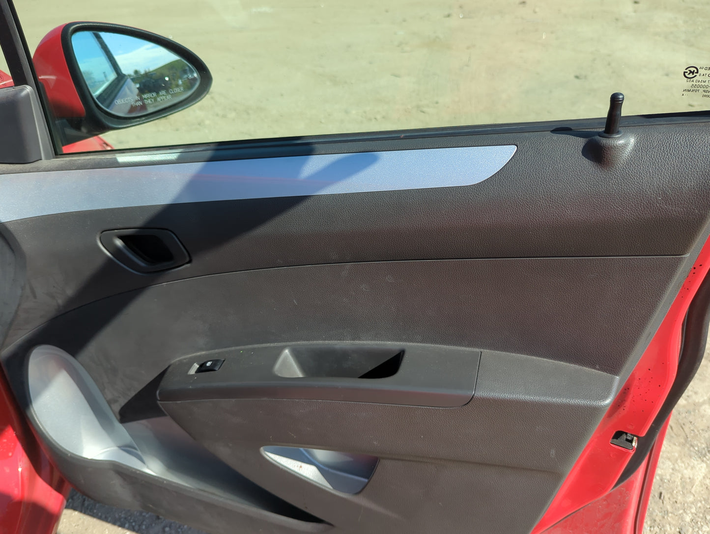2014 Chevrolet Spark Front Right Passenger Interior Door Panel Trim - Oemusedautoparts1.com