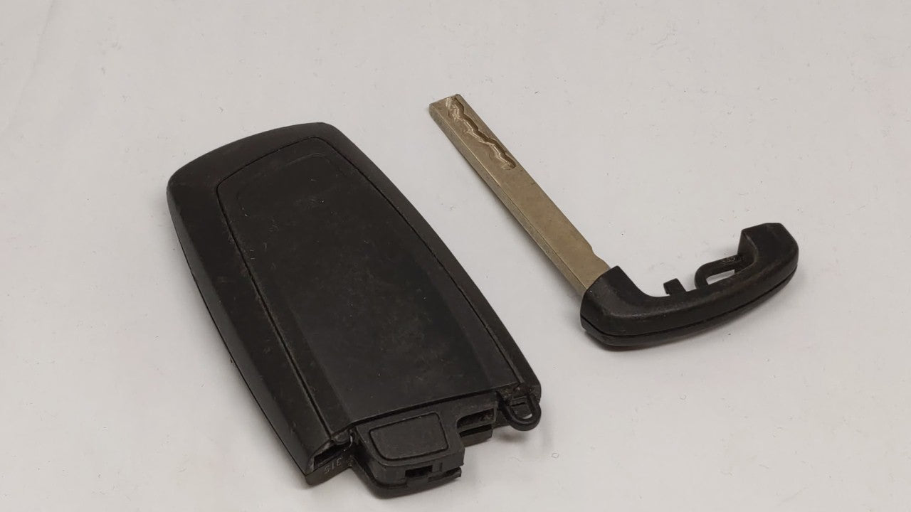 Bmw Keyless Entry Remote Ygohuf5662 9 266 845-02 4 Buttons - Oemusedautoparts1.com