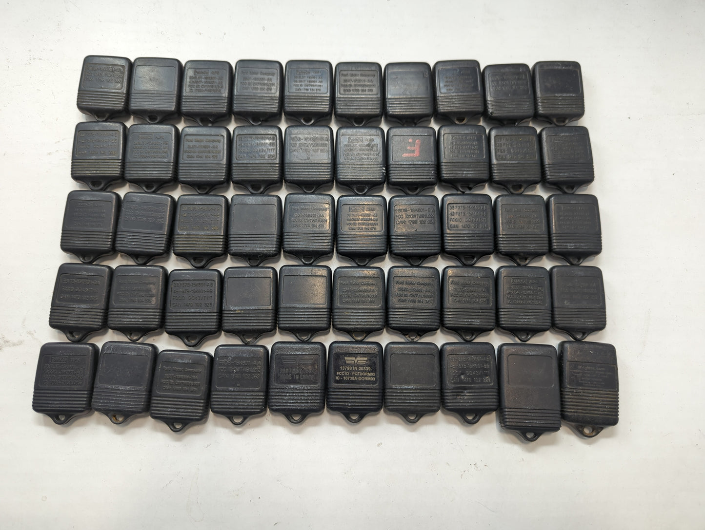 Lot of 50 Ford Keyless Entry Remote Fob MIXED FCC IDS MIXED PART NUMBERS - Oemusedautoparts1.com