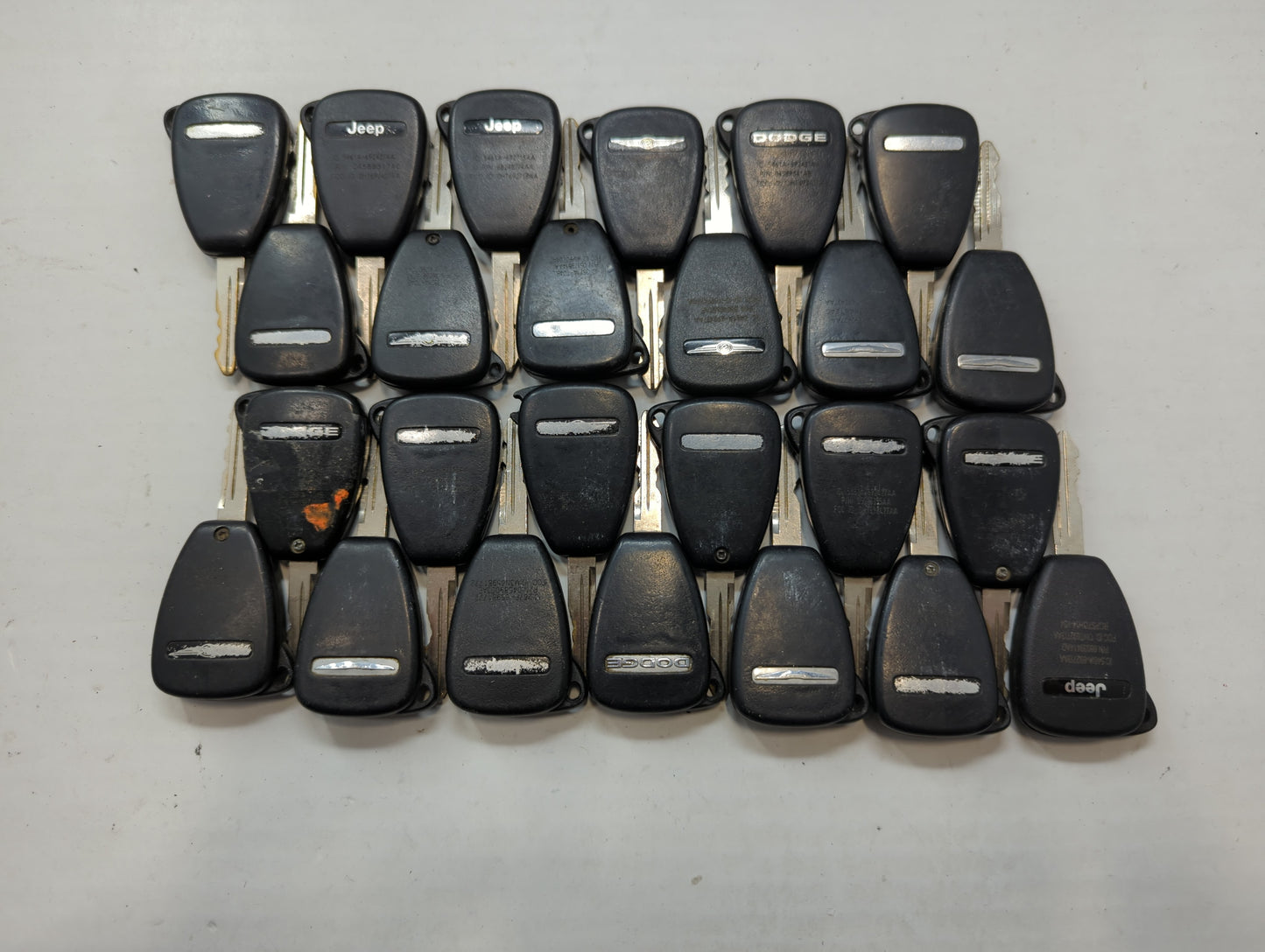 Lot of 25 Dodge Keyless Entry Remote Fob MIXED FCC IDS MIXED PART NUMBERS - Oemusedautoparts1.com