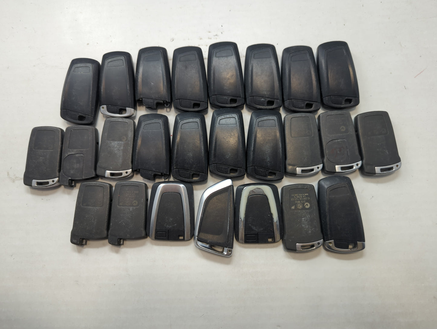 Lot of 25 Bmw Keyless Entry Remote Fob MIXED FCC IDS MIXED PART NUMBERS - Oemusedautoparts1.com