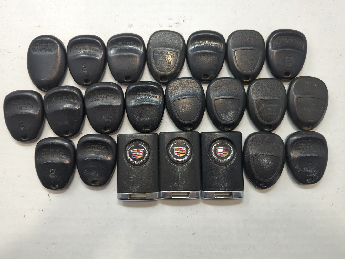 Lot of 22 Chevrolet Keyless Entry Remote Fob MIXED FCC IDS MIXED PART - Oemusedautoparts1.com