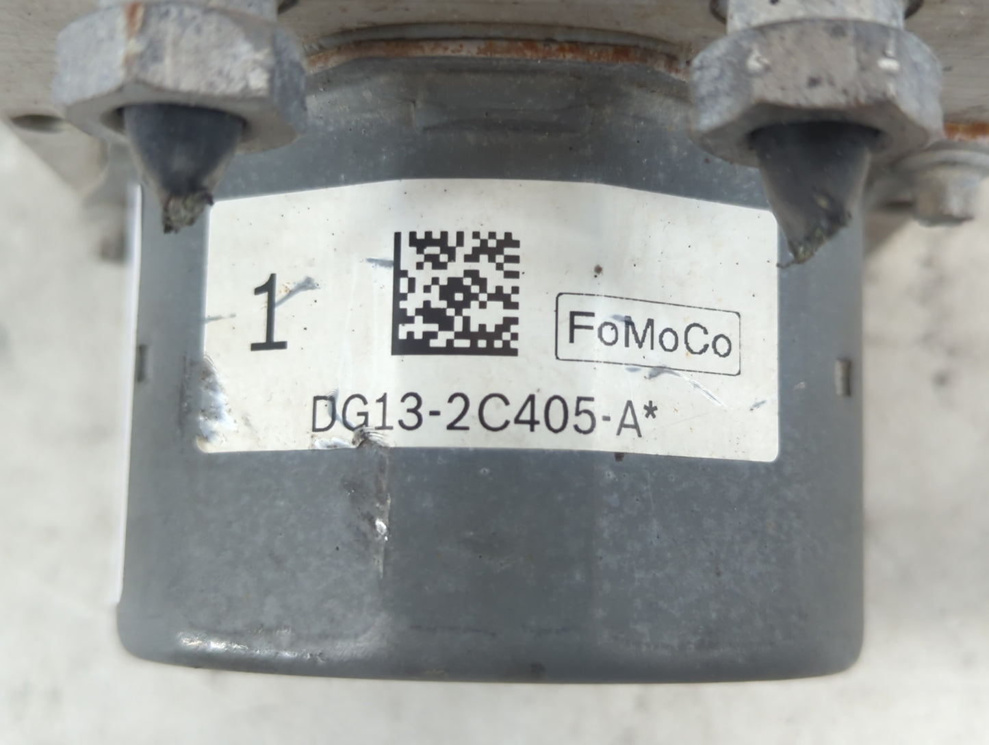 2013-2014 Ford Taurus ABS Pump Control Module Replacement P/N:DG13-2C405-A Fits Fits 2013 2014 OEM Used Auto Parts - Oemusedautoparts1.com
