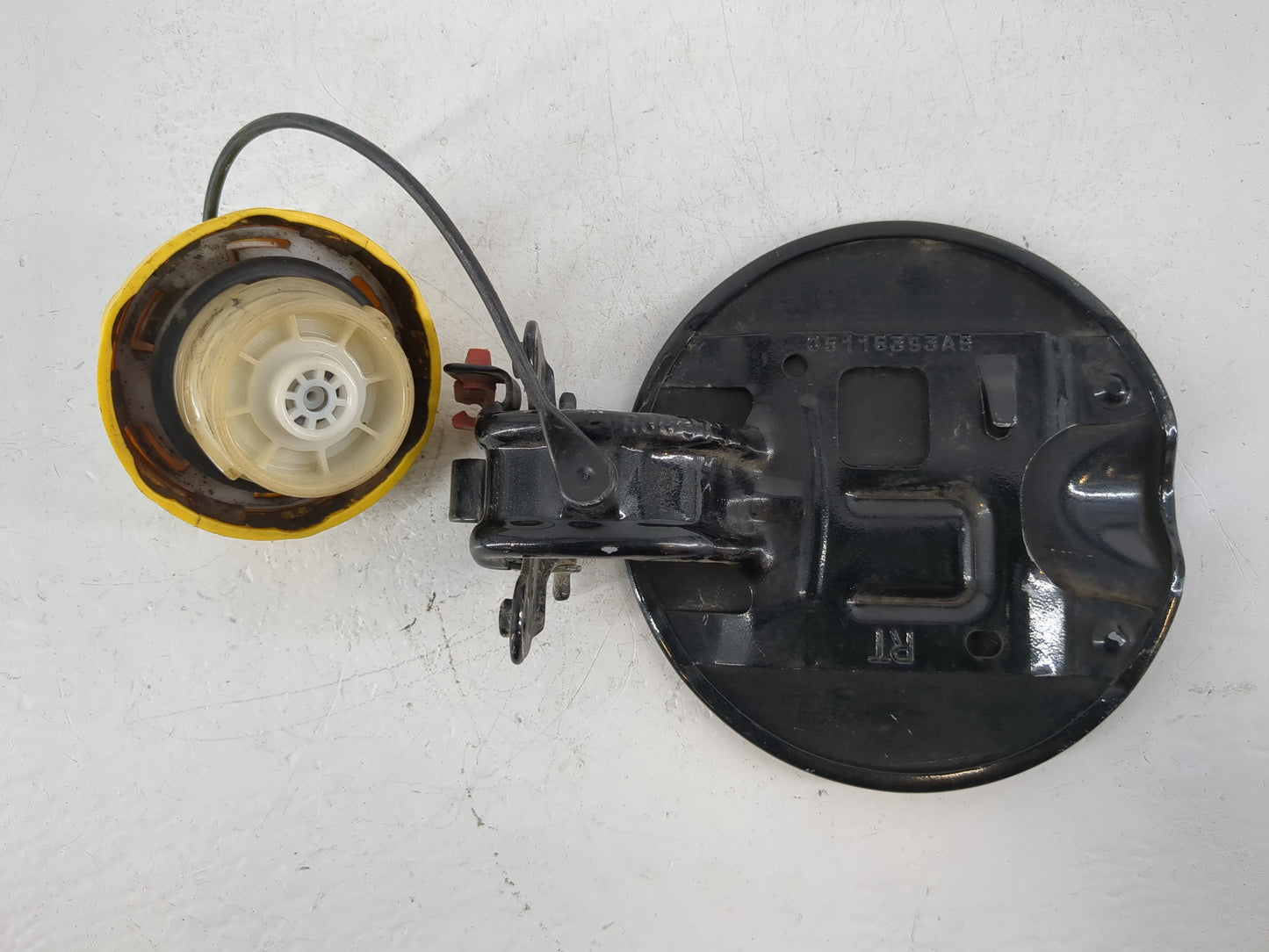 2014 Chrysler Town & Country Fuel Tank Door Lid Gas Tank Black - Oemusedautoparts1.com