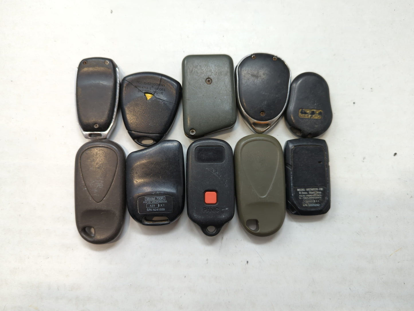Lot of 10 Aftermarket Keyless Entry Remote Fob MIXED FCC IDS MIXED PART - Oemusedautoparts1.com