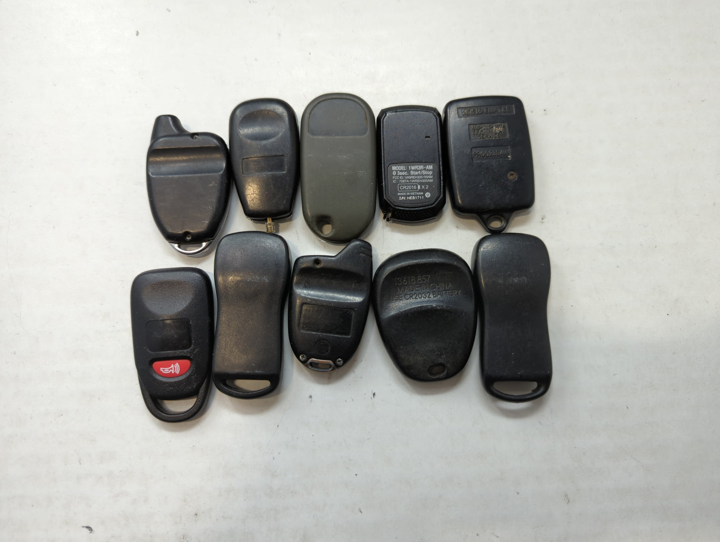 Lot of 10 Aftermarket Keyless Entry Remote Fob MIXED FCC IDS MIXED PART - Oemusedautoparts1.com