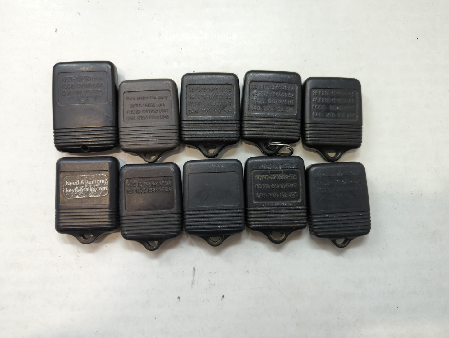 Lot of 10 Aftermarket Ford Keyless Entry Remote Fob MIXED FCC IDS MIXED - Oemusedautoparts1.com