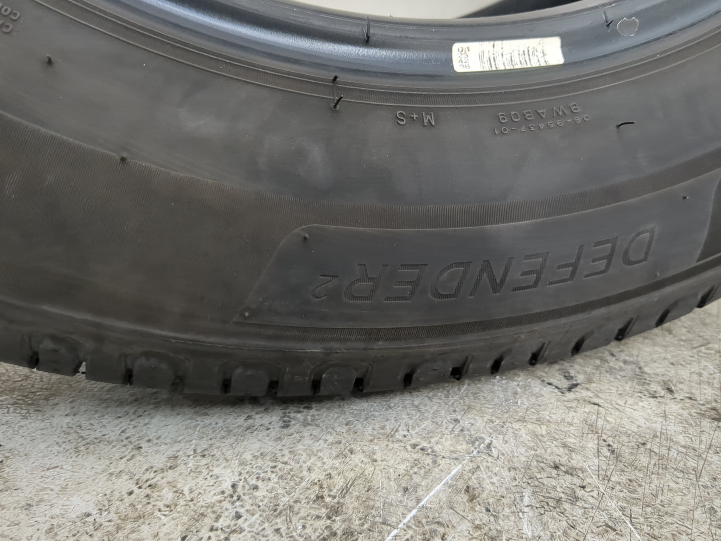 Used Tire 225/65R17 MICHELIN DEFENDER 2 102H - Tread Depth 8.5/32 - Oemusedautoparts1.com