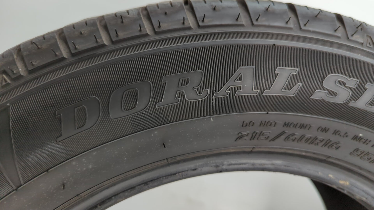 Used Tire 215/60R16 DORAL SDL-SPORT 95H All Season - Tread Depth 8/32 - Oemusedautoparts1.com
