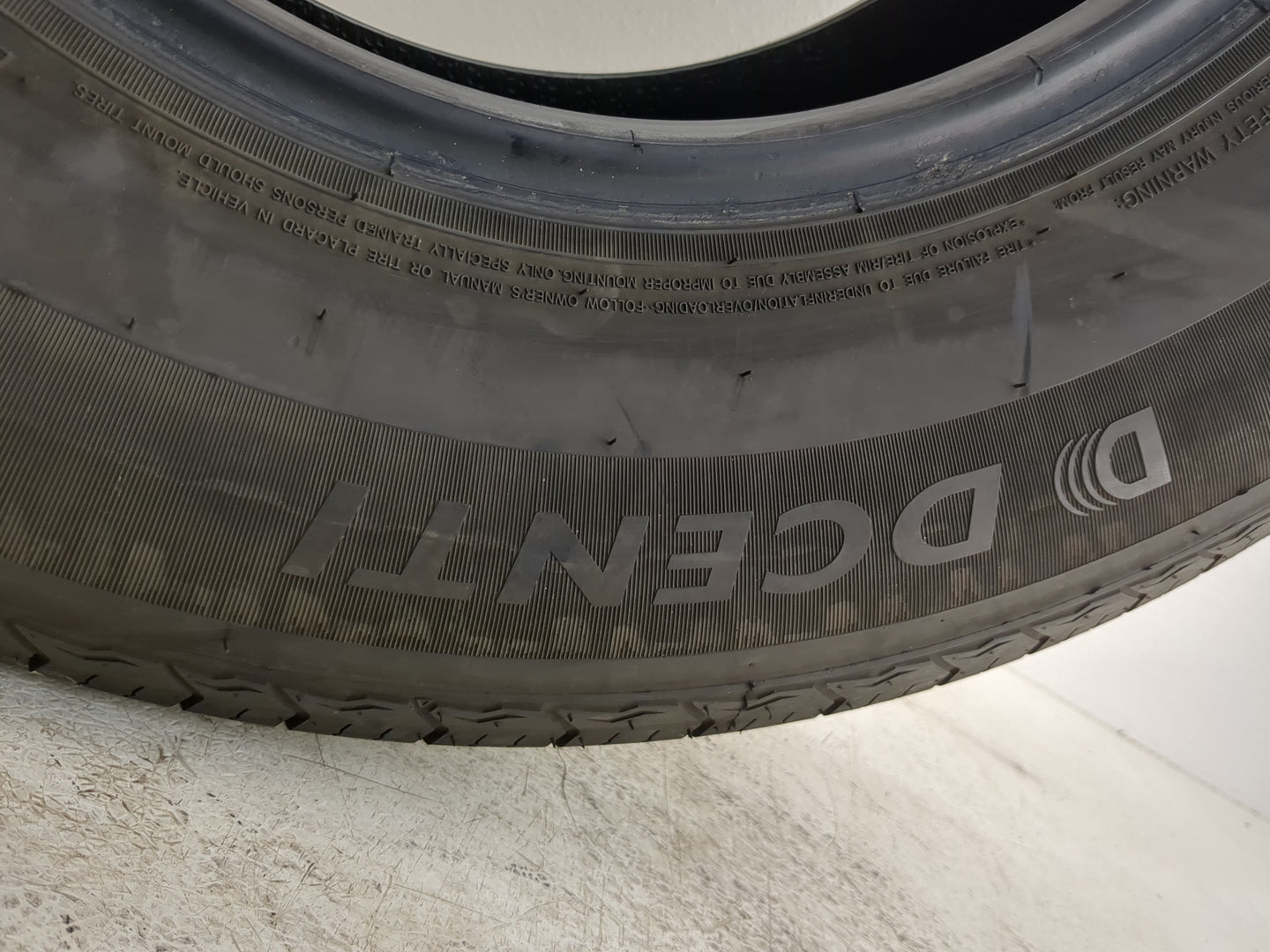 Used Tire 235/70R15 DCENTI DC66 102T - Tread Depth 9.5/32 - Oemusedautoparts1.com