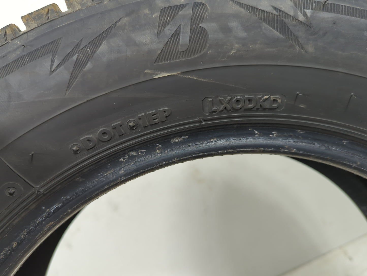 Used Tire 185/65R15 BRIDGESTONE BLIZZAK WS90 88T - Tread Depth 9/32 - Oemusedautoparts1.com