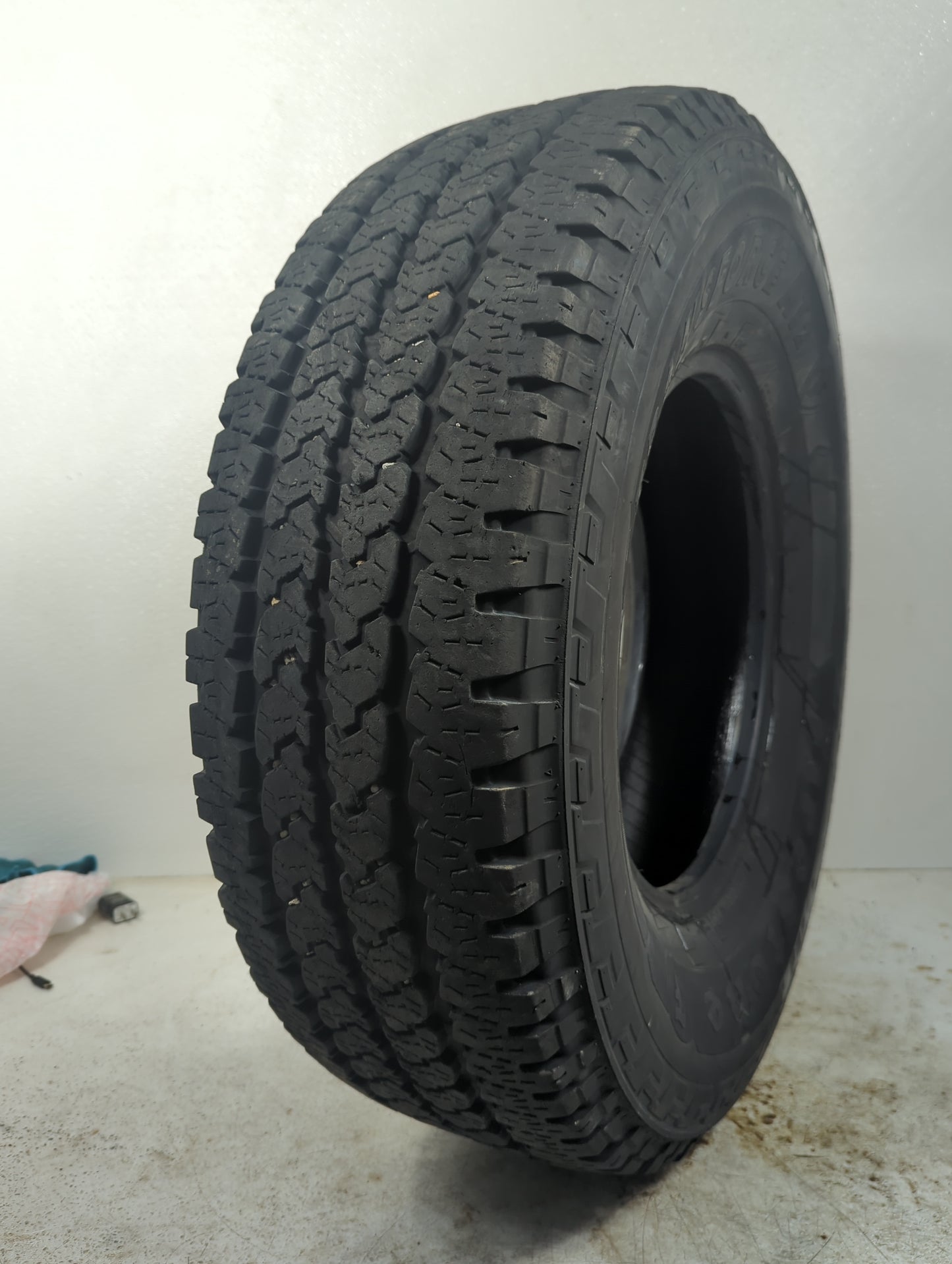 Used Tire 265/75R16 FIRESTONE TRANSFORCE AT2 123R - Tread Depth 11/32 - Oemusedautoparts1.com