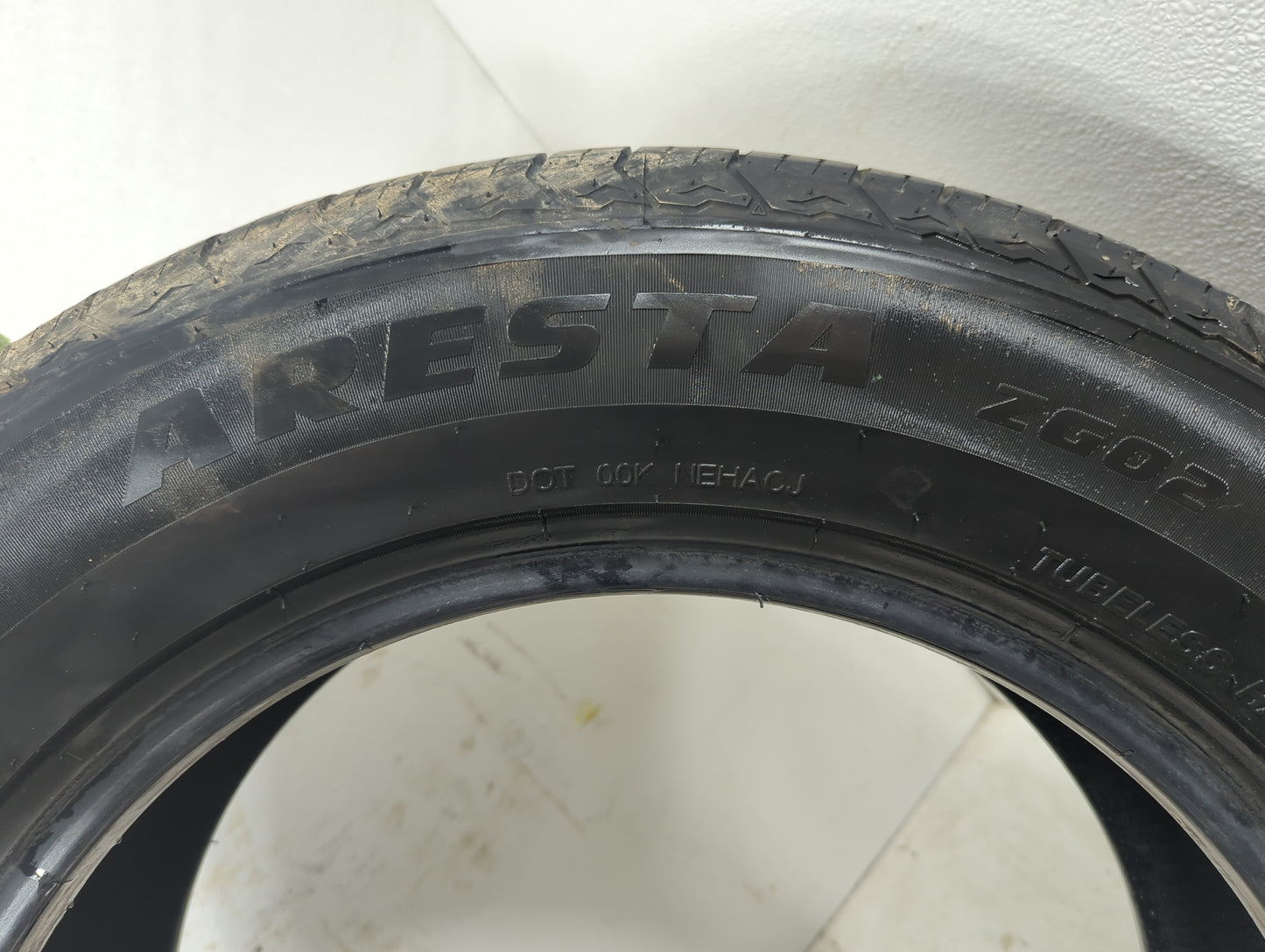 Used Tire 245/60R18 ARISUN ARESTA ZG02 105T - Tread Depth 8/32 - Oemusedautoparts1.com