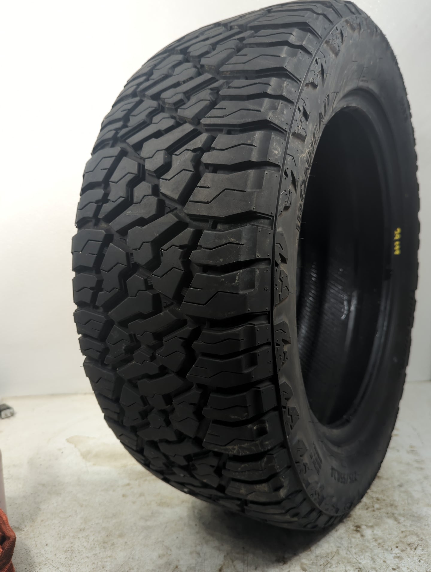 Used Tire 275/55R20 IRONHEAD THRASHER AT 117T - Tread Depth 13/32 - Oemusedautoparts1.com