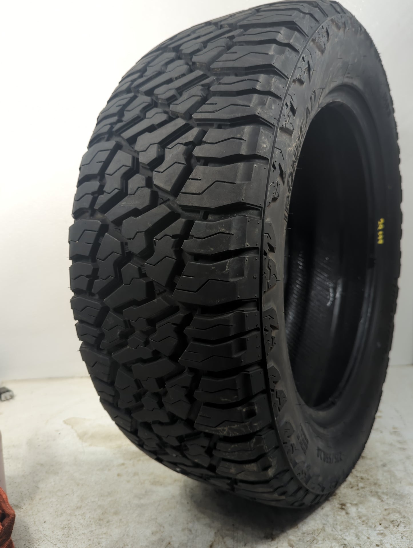 Used Tire 275/55R20 IRONHEAD THRASHER AT 117T - Tread Depth 13/32 - Oemusedautoparts1.com