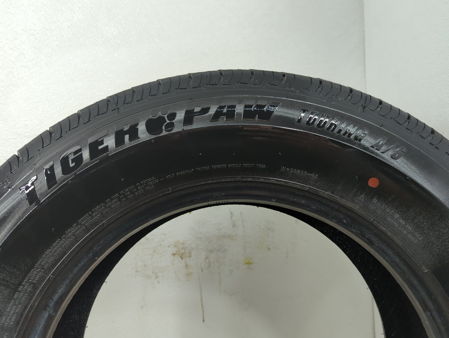 Used Tire 205/70R16 UNIROYAL TIGER PAW TOURING A/S 97H - Tread Depth 8/32 - Oemusedautoparts1.com