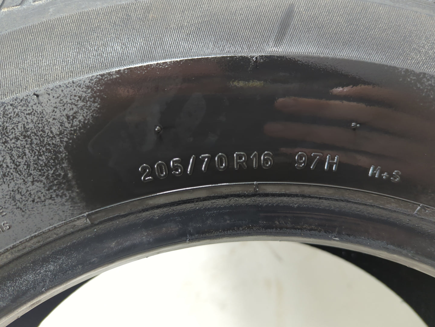Used Tire 205/70R16 UNIROYAL TIGER PAW TOURING A/S 97H - Tread Depth 8/32 - Oemusedautoparts1.com