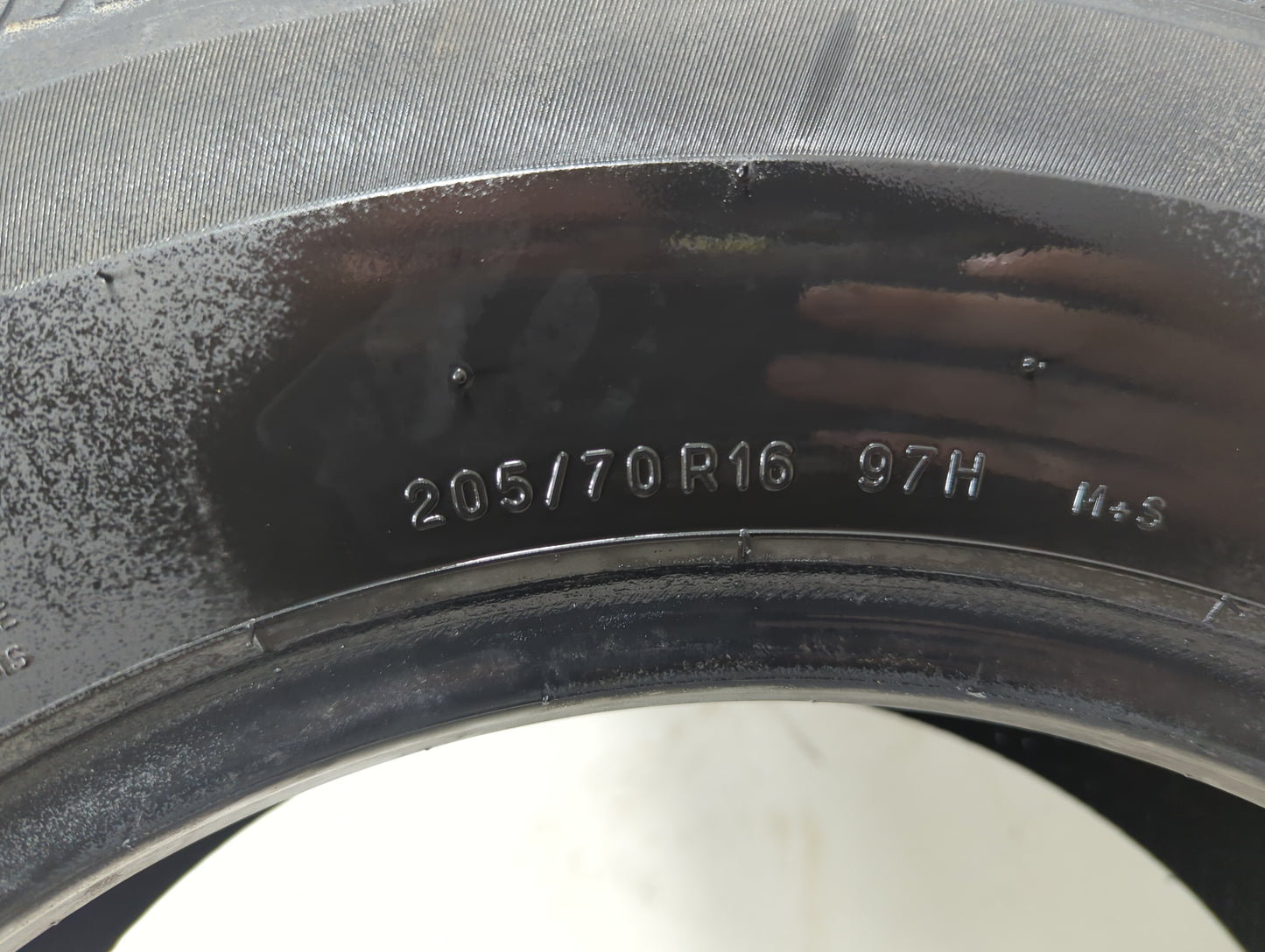 Used Tire 205/70R16 UNIROYAL TIGER PAW TOURING A/S 97H - Tread Depth 8/32 - Oemusedautoparts1.com