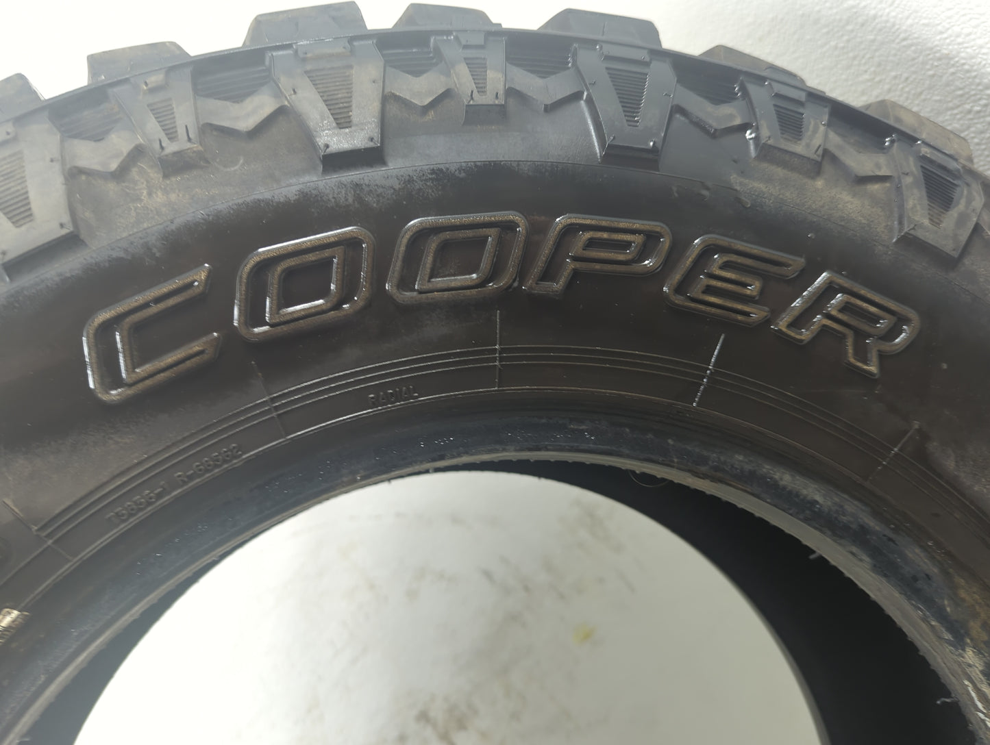 Used Tire 265/70R17 COOPER EVOLUTION M/T 121Q - Tread Depth 11/32 - Oemusedautoparts1.com