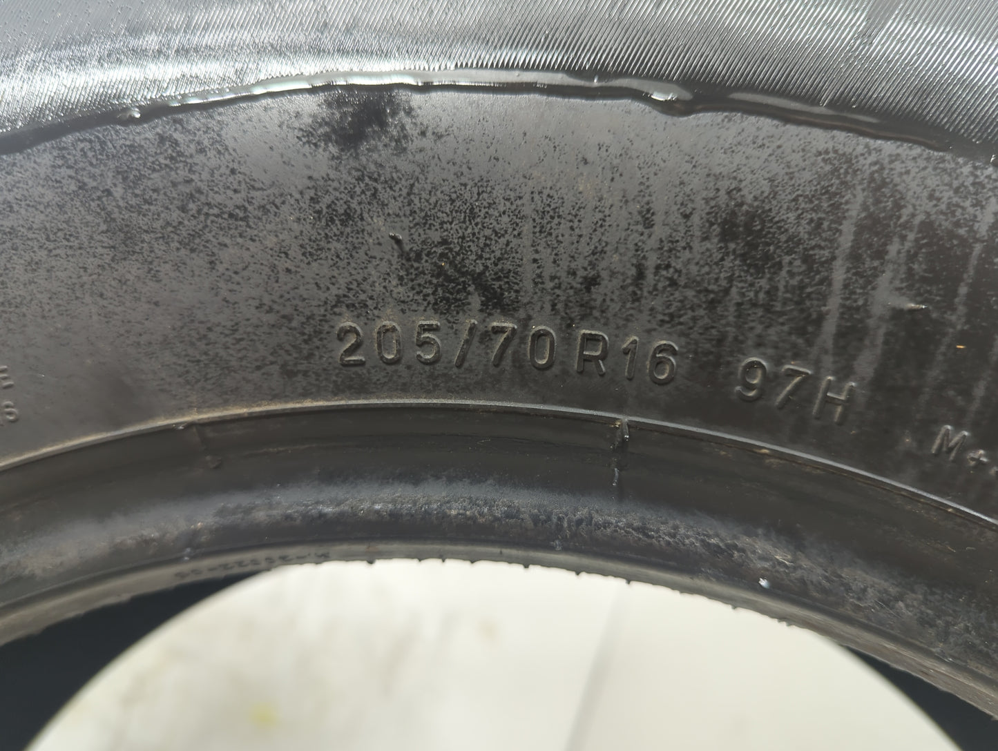 Used Tire 205/70R16 UNIROYAL TIGER PAW TOURING A/S 97H - Tread Depth 9/32 - Oemusedautoparts1.com
