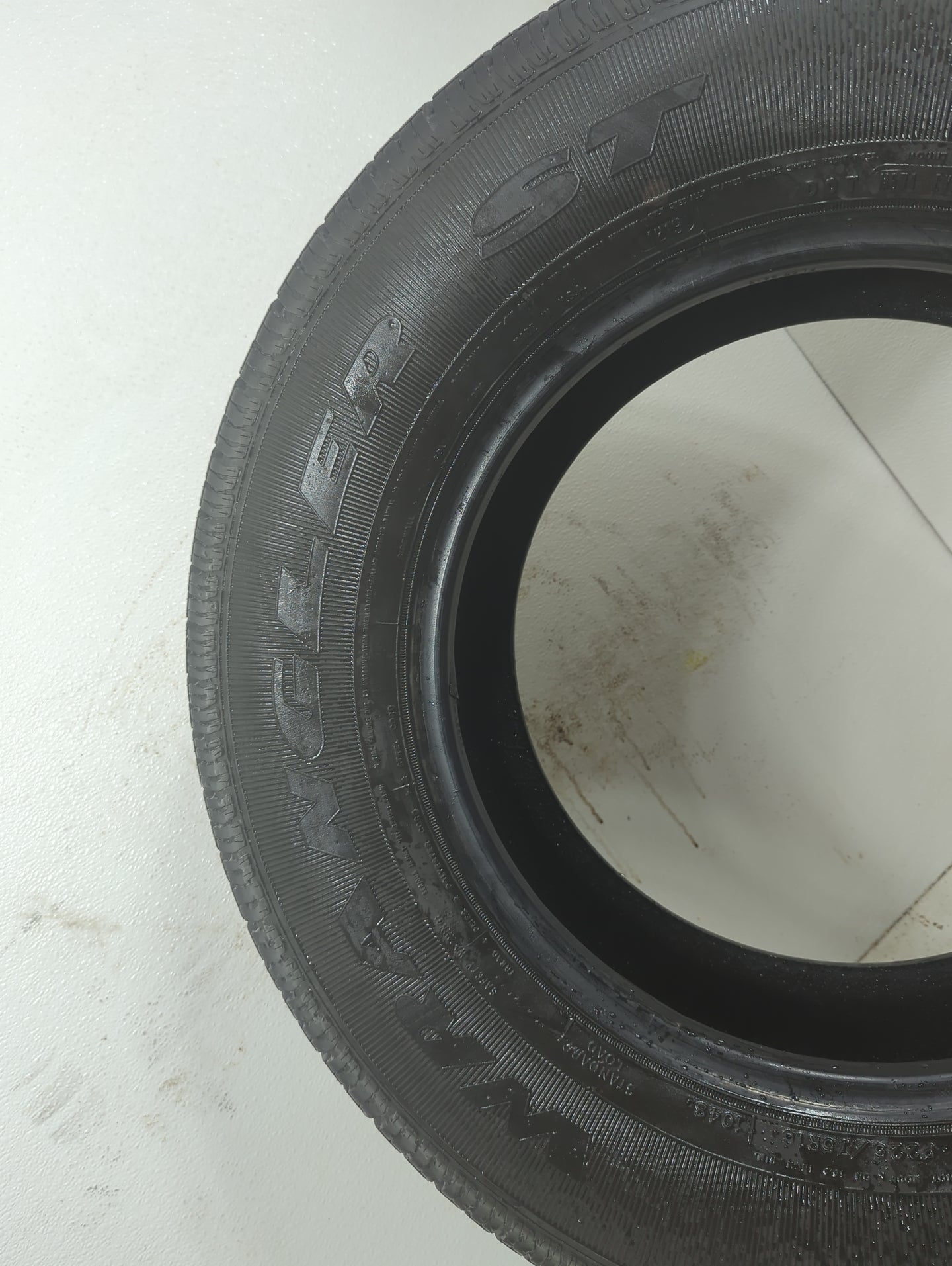 Used Tire 225/75R16 GOODYEAR WRANGLER ST 104S - Tread Depth null/32 - Oemusedautoparts1.com