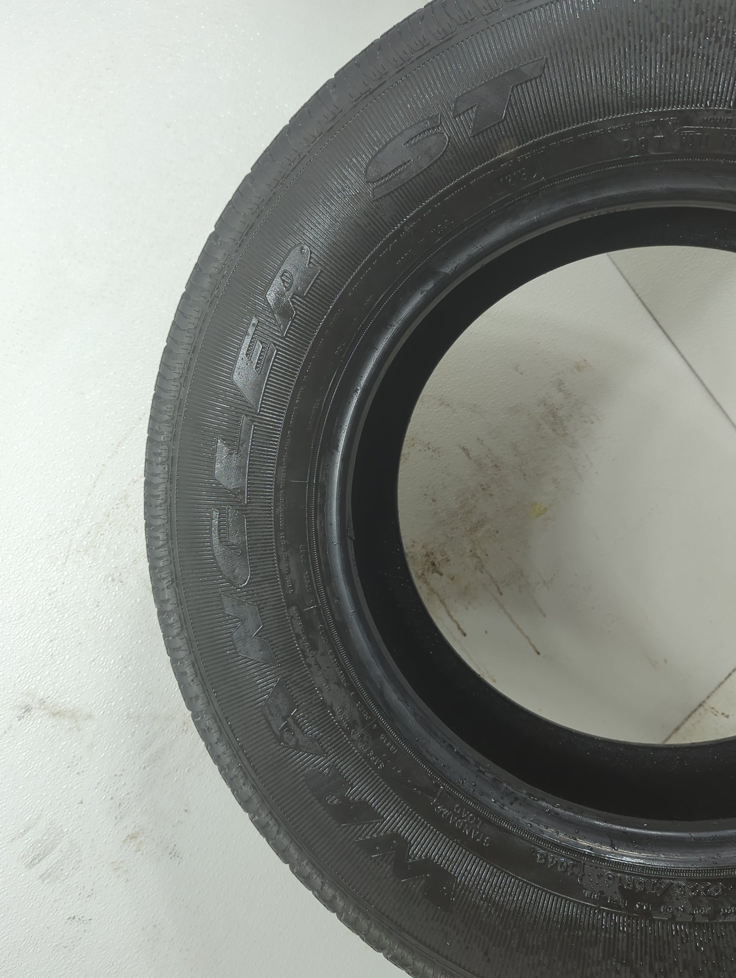 Used Tire 225/75R16 GOODYEAR WRANGLER ST 104S - Tread Depth null/32 - Oemusedautoparts1.com