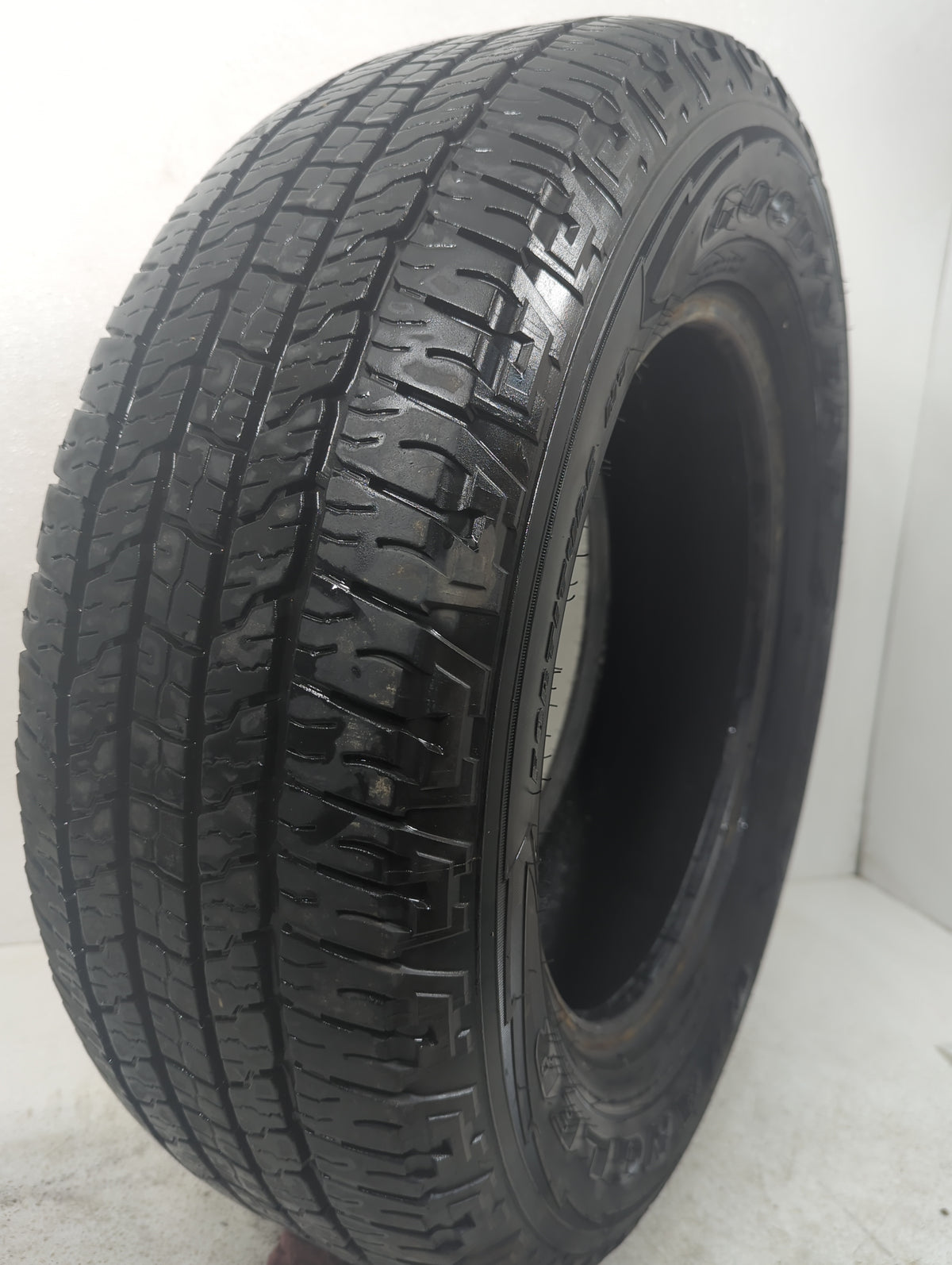Used Tire 245/65R17 GOODYEAR WRANGLER FORTITUDE HT 107T - Tread Depth 8/32 - Oemusedautoparts1.com
