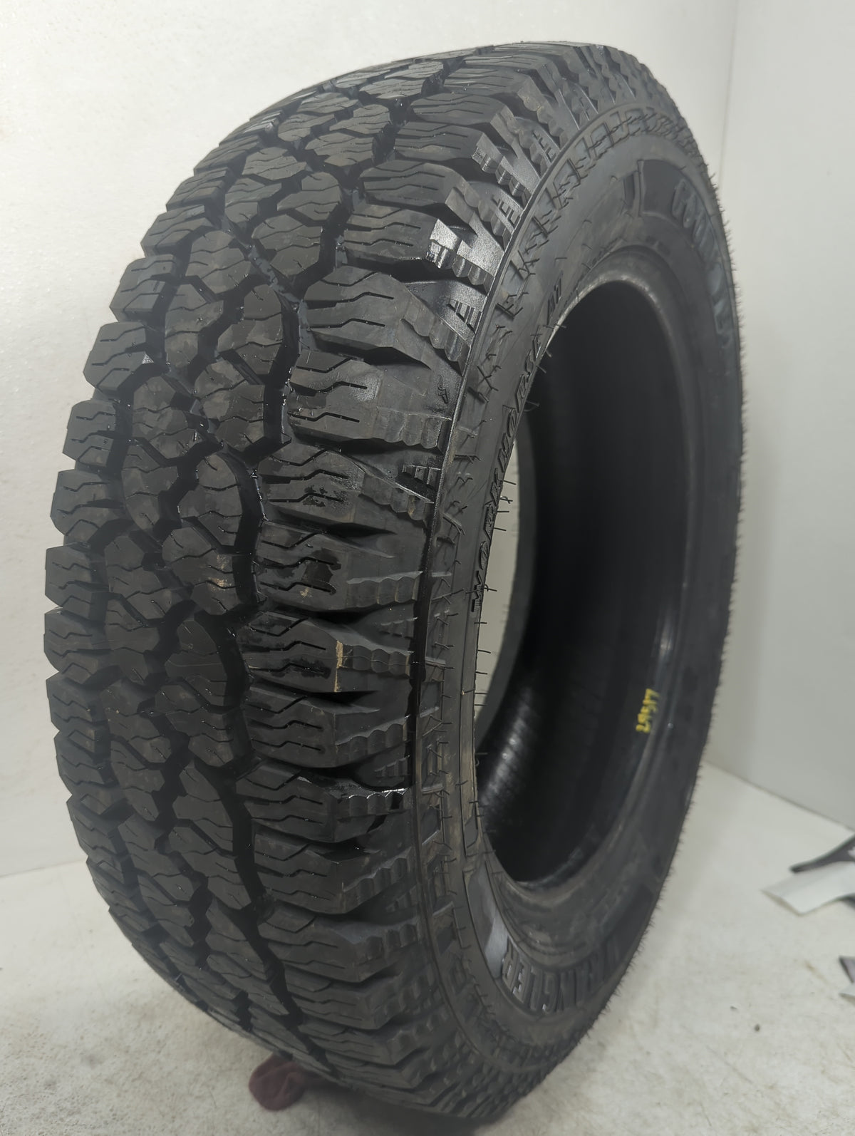 Used Tire LT225/65R17 GOODYEAR WRANGLER WORKHORSE AT 107H - Tread Depth 15/32 - Oemusedautoparts1.com
