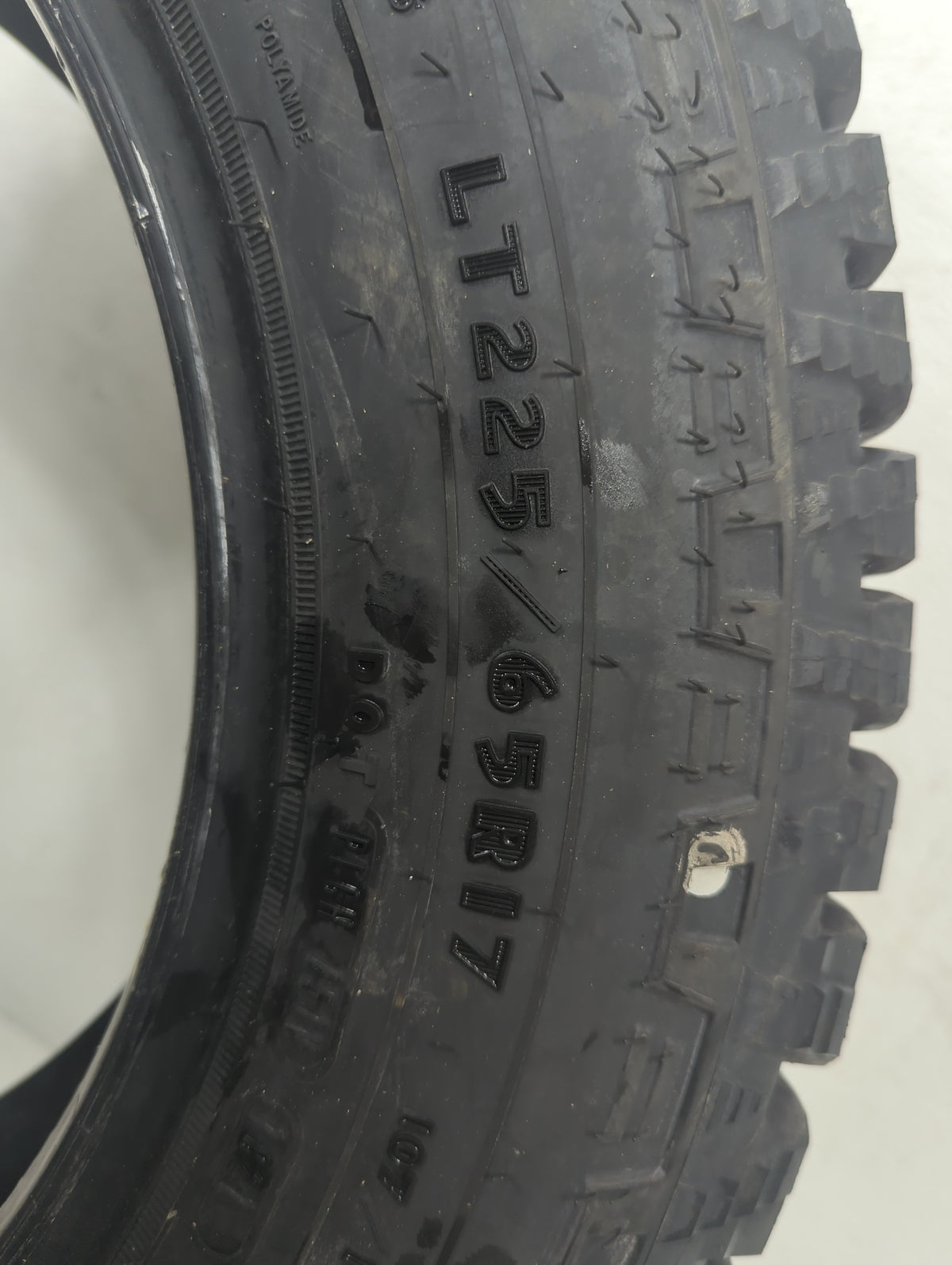 Used Tire LT225/65R17 GOODYEAR WRANGLER WORKHORSE AT 107H - Tread Depth 15/32 - Oemusedautoparts1.com