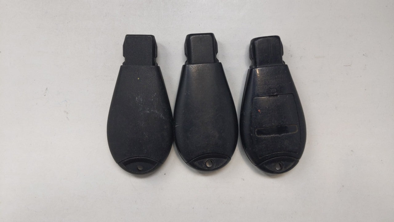Lot of 3 Aftermarket Keyless Entry Remote Fob MIXED FCC IDS MIXED PART - Oemusedautoparts1.com