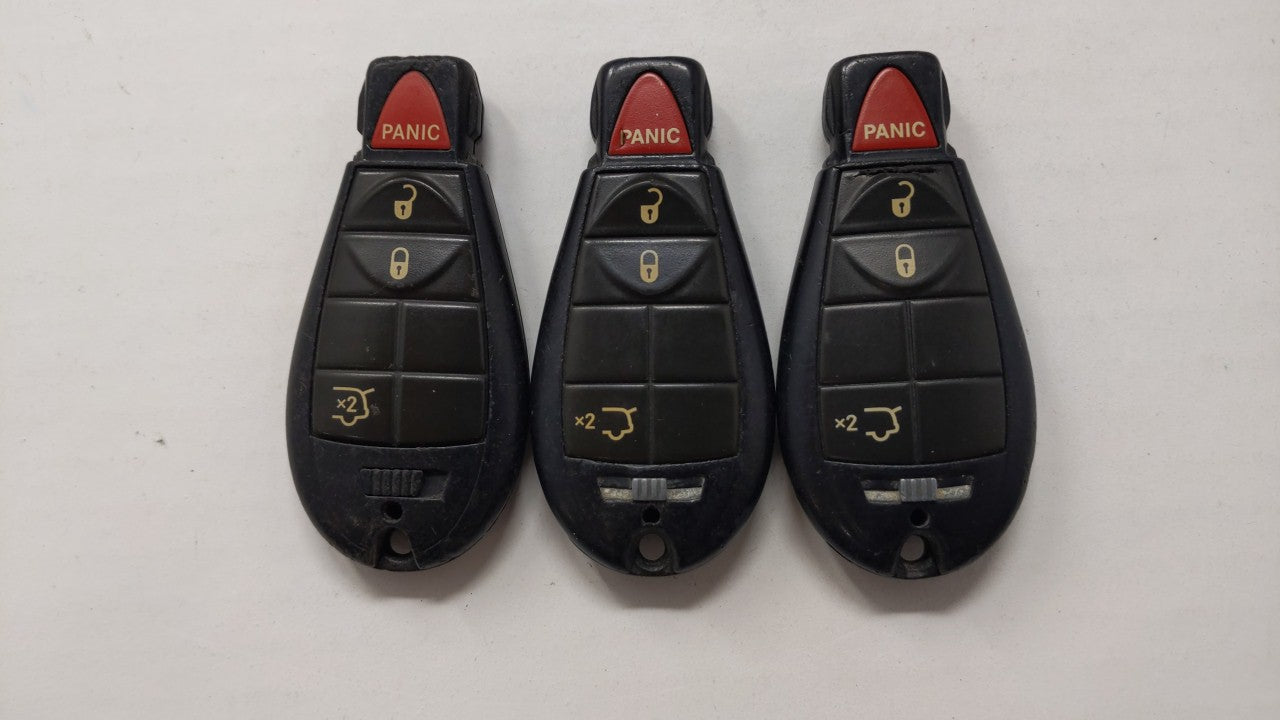 Lot of 3 Aftermarket Keyless Entry Remote Fob MIXED FCC IDS MIXED PART - Oemusedautoparts1.com