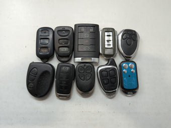 compare product Lot of 10 Aftermarket Keyless Entry Remote Fob MIXED FCC IDS MIXED PART