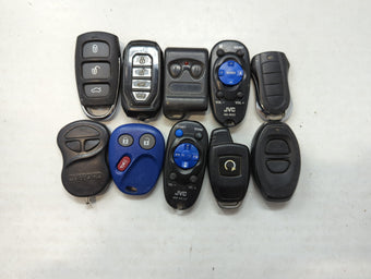 compare product Lot of 10 Aftermarket Keyless Entry Remote Fob MIXED FCC IDS MIXED PART