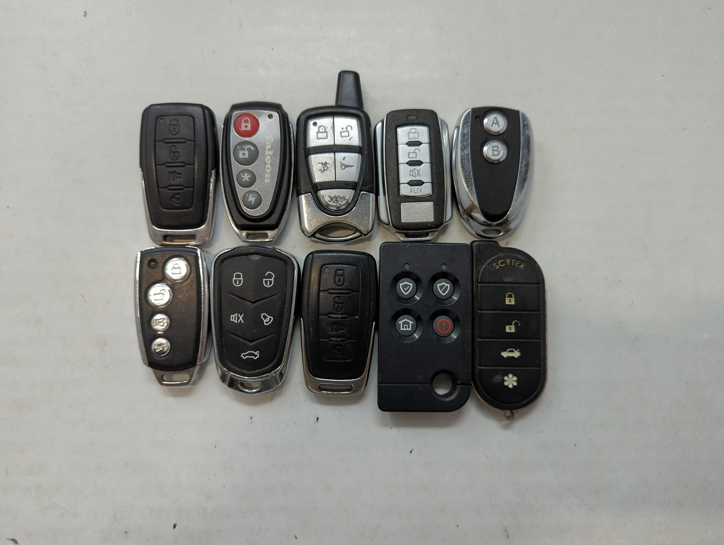 Lot of 10 Aftermarket Keyless Entry Remote Fob MIXED FCC IDS MIXED PART - Oemusedautoparts1.com