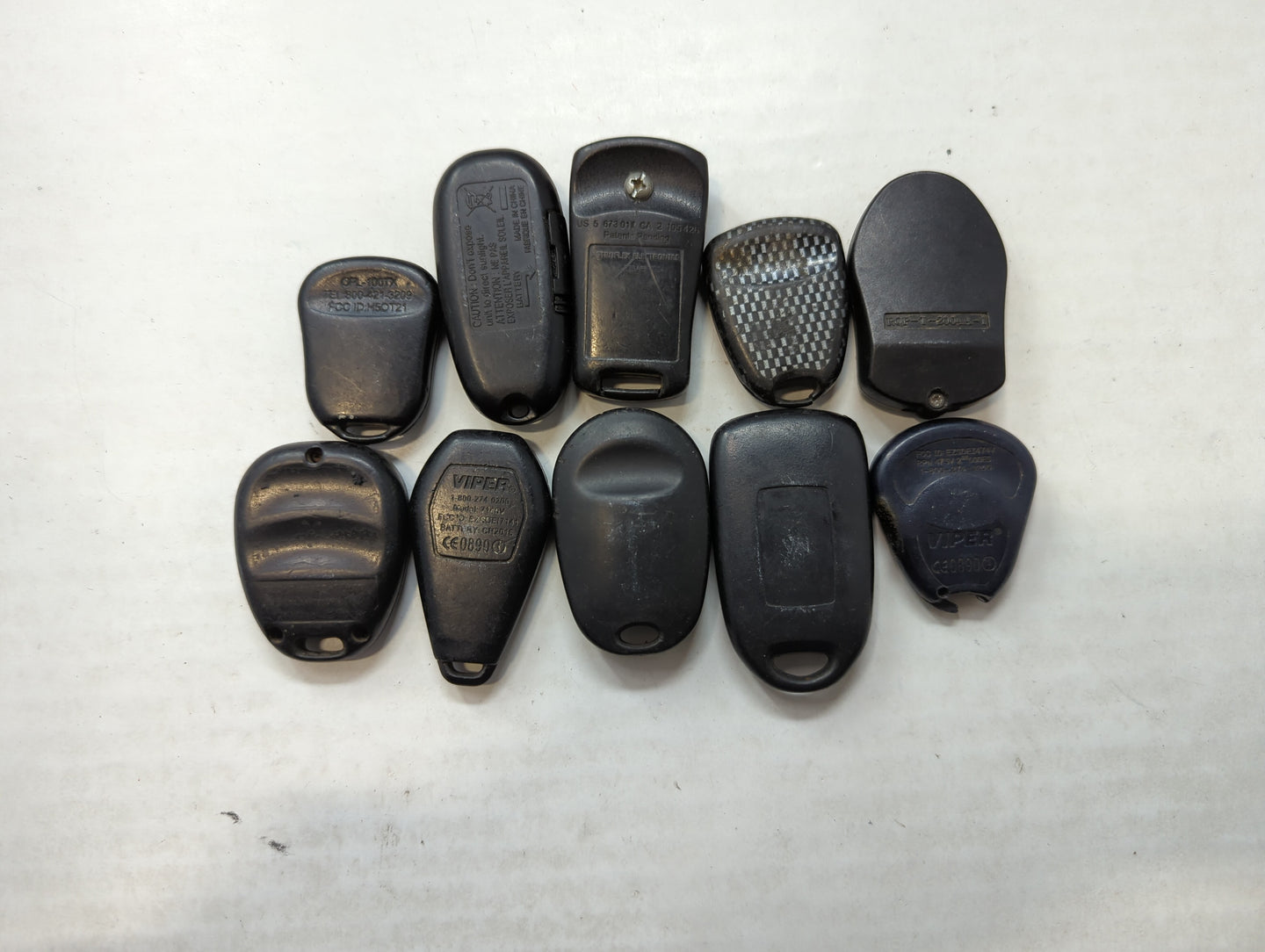 Lot of 10 Aftermarket Keyless Entry Remote Fob MIXED FCC IDS MIXED PART - Oemusedautoparts1.com