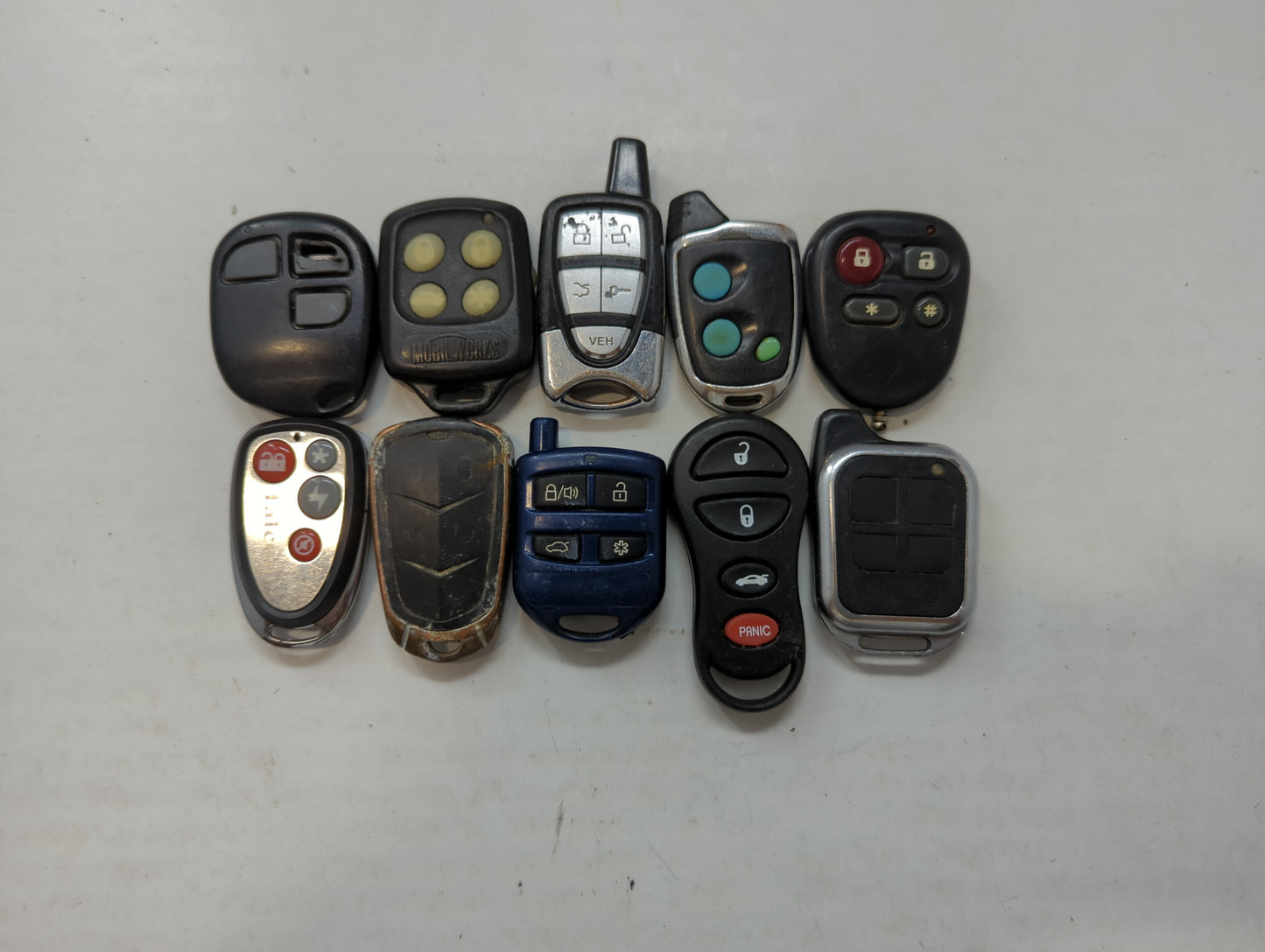Lot of 10 Aftermarket Keyless Entry Remote Fob MIXED FCC IDS MIXED PART - Oemusedautoparts1.com
