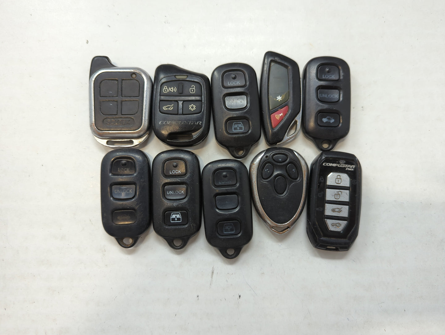 Lot of 10 Aftermarket Keyless Entry Remote Fob MIXED FCC IDS MIXED PART - Oemusedautoparts1.com