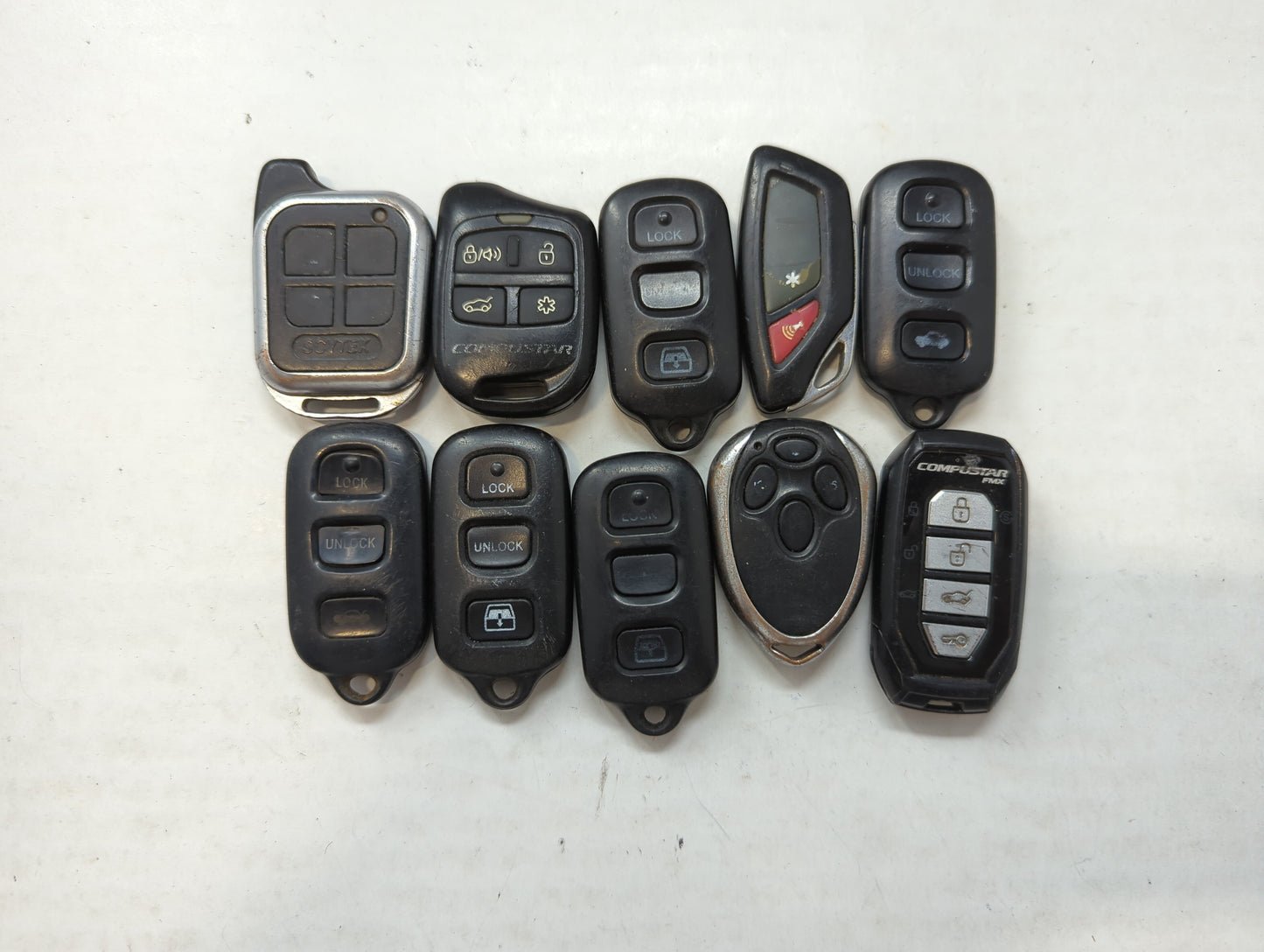 Lot of 10 Aftermarket Keyless Entry Remote Fob MIXED FCC IDS MIXED PART - Oemusedautoparts1.com