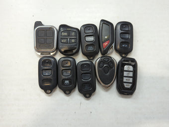 compare product Lot of 10 Aftermarket Keyless Entry Remote Fob MIXED FCC IDS MIXED PART