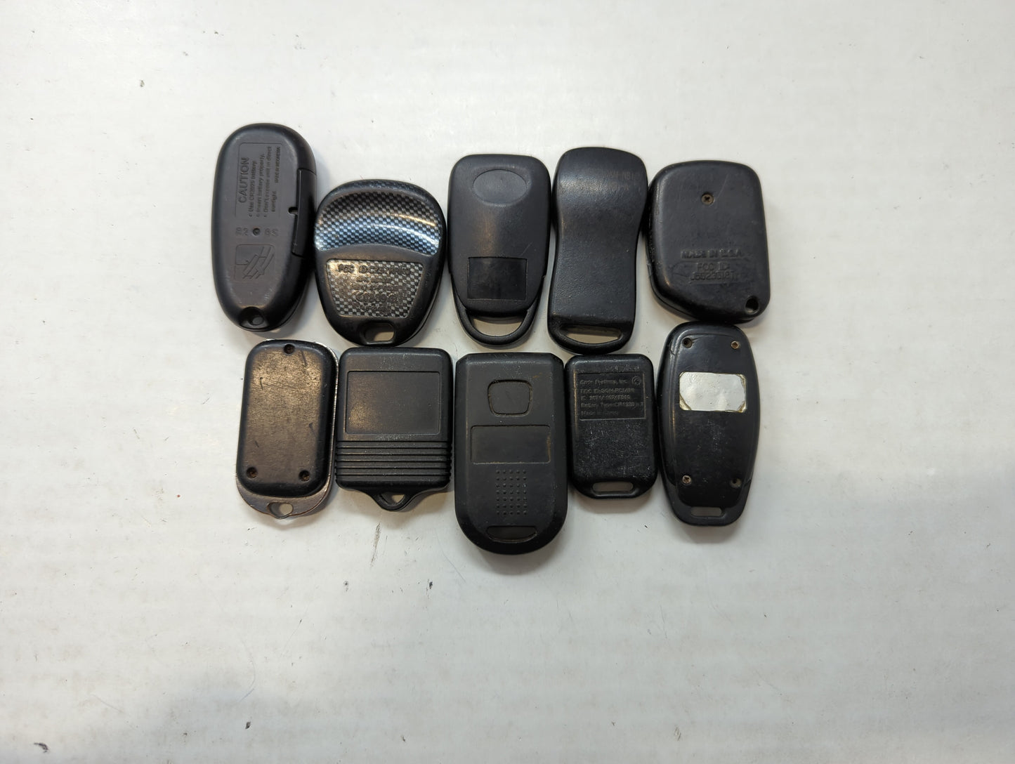 Lot of 10 Aftermarket Keyless Entry Remote Fob MIXED FCC IDS MIXED PART - Oemusedautoparts1.com