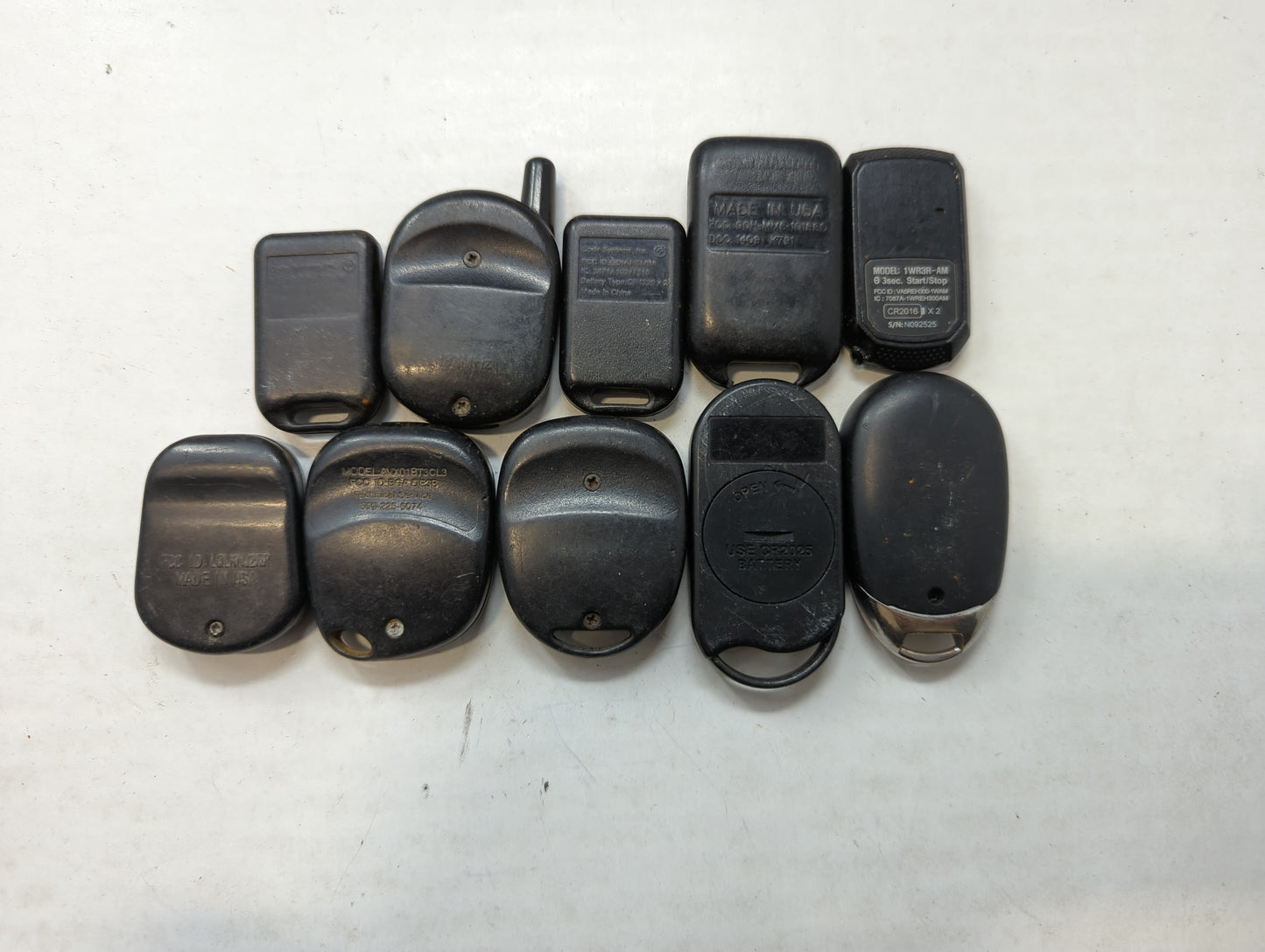 Lot of 10 Aftermarket Keyless Entry Remote Fob MIXED FCC IDS MIXED PART - Oemusedautoparts1.com