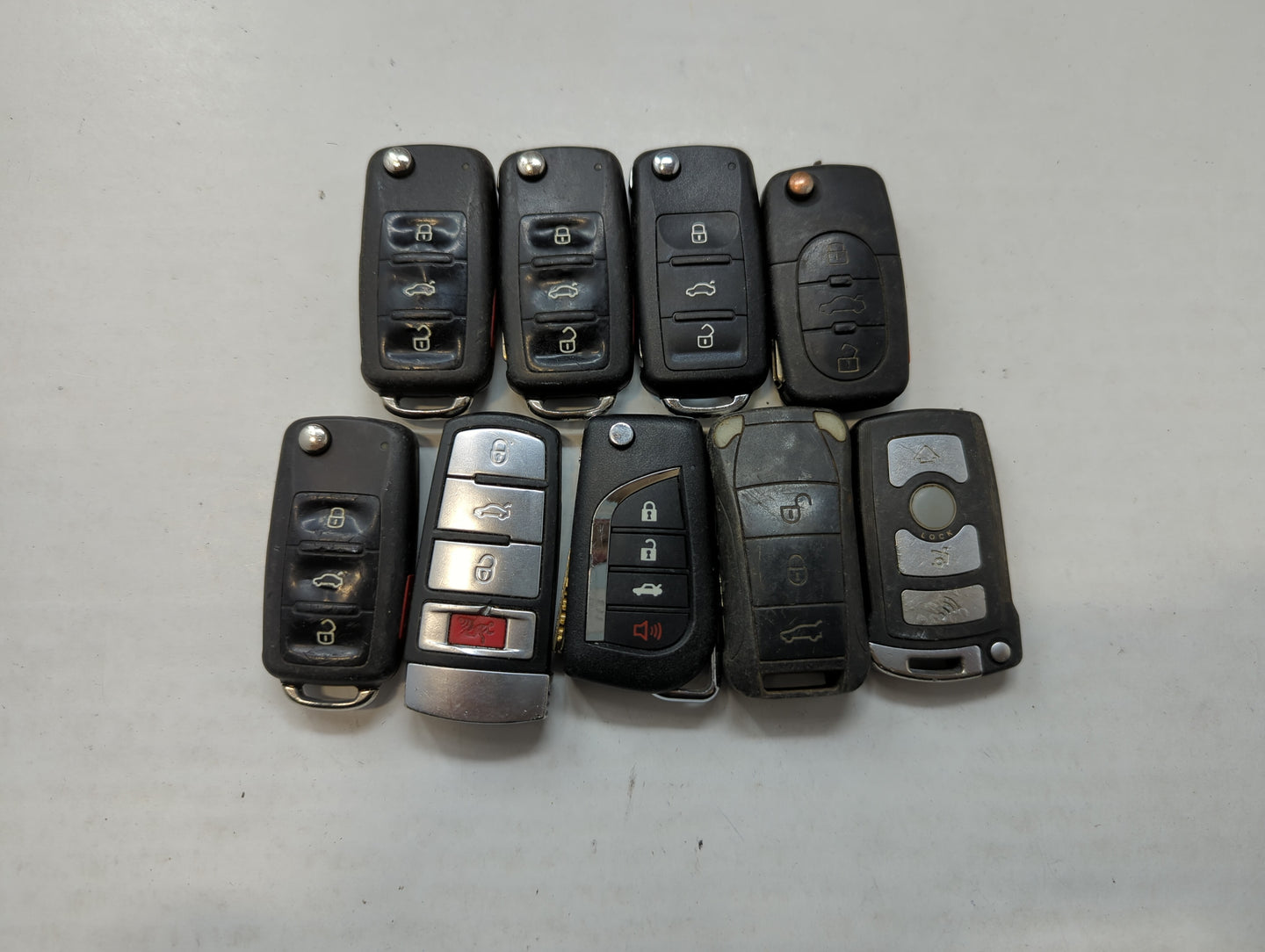 Lot of 9 Aftermarket Keyless Entry Remote Fob MIXED FCC IDS MIXED PART - Oemusedautoparts1.com