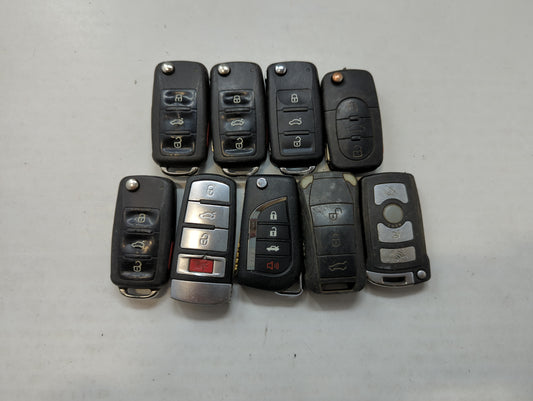 Lot of 9 Aftermarket Keyless Entry Remote Fob MIXED FCC IDS MIXED PART - Oemusedautoparts1.com