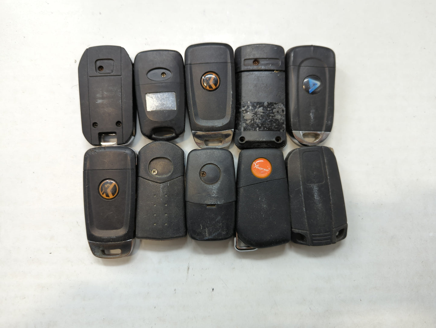 Lot of 10 Aftermarket Keyless Entry Remote Fob MIXED FCC IDS MIXED PART - Oemusedautoparts1.com